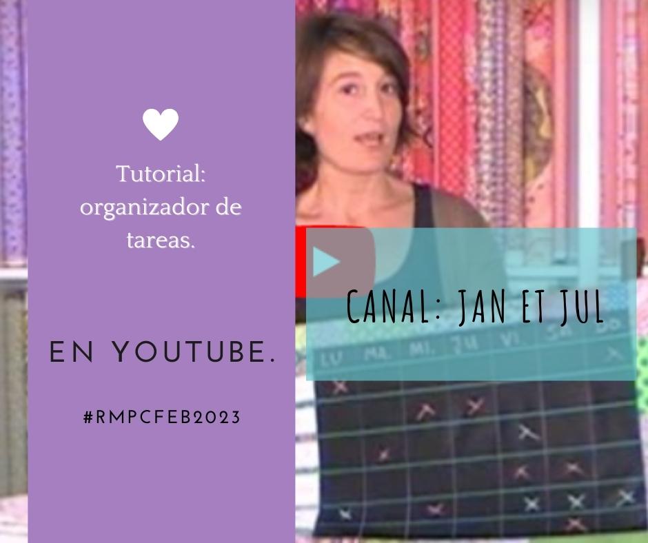 Imagen de fondo del tutorial de Jan et Jul del organizador de tareas. Superpuesto a esa imagen en la parte izquierda y abarcando todo el alto del cartel aparece un rectángulo morado con el tipo de proyecto, el hashtag #rmpcfeb2023 e indicando que es en YouTube. A poca distancia de ese rectángulo, aunque en menor tamaño y con transparencia de un fondo verde turquesa figura el nombre del canal: Jan et Jul.